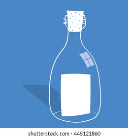 Message in a Bottle concept with a clear glass bottle and a sheet of blank white paper inside  with copy space for text as a note