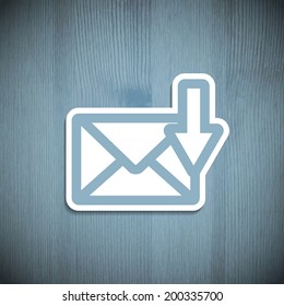 Message icon on a wooden background. Vector