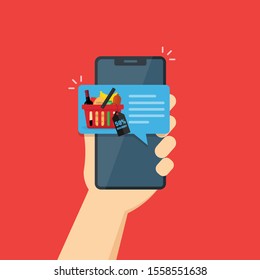 A message or notification for regular customers on the mobile phone screen about discounts on products in the supermarket. basket with a set of products. Hand holds a smartphone.Vector illustration.