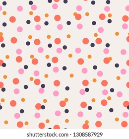 Messy dots on beige background. Festive seamless pattern with round shapes. Dotted texture for wrapping paper, web. Vector illustration.