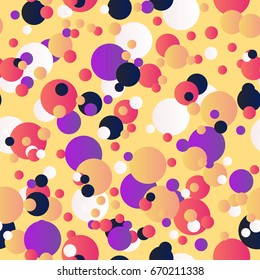 Messy dots on yellow background. Colorful circles seamless pattern. 
