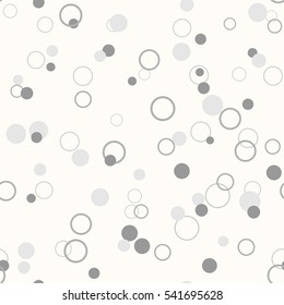 Puntos y anillos gris desordenados sobre fondo blanco. Colorido estilo festivo sin fisuras con formas redondeadas. Textura de puntos grunge para envolver papel, tela. Ilustración vectorial.