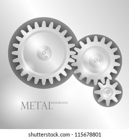 Metal background with pinions. EPS10 Vector.