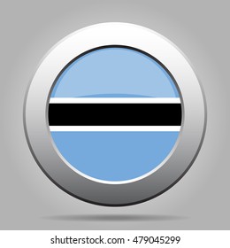 metal button with the national flag of Botswana on a gray background