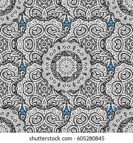 Metal with floral pattern. Vector golden floral ornament brocade textile pattern, white doodles. Blue background with golden elements. Seamless golden pattern.