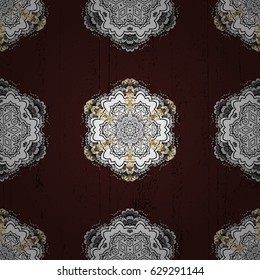 Metal with floral pattern. Vector golden floral ornament brocade textile pattern. Brown background with golden elements. Golden pattern.