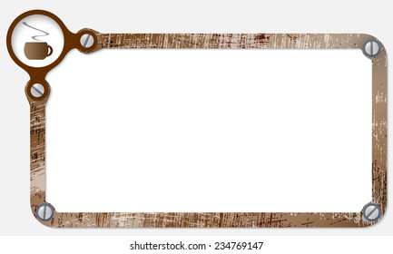 metal frame for text with screws and cup of coffee
