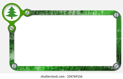 metal frame for text with screws and tree symbol