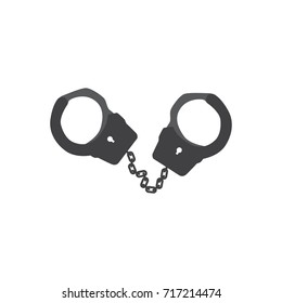Metal handcuffs for detaining criminals. Outfit of a policeman