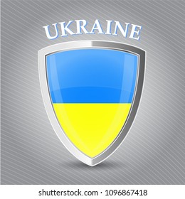 Metal icon or symbol with Ukrainian flag with text Ukraine.