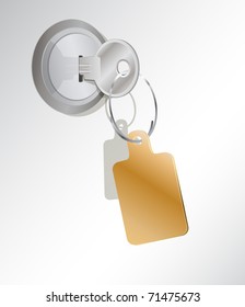 a metal key in a lock  with an empty tag