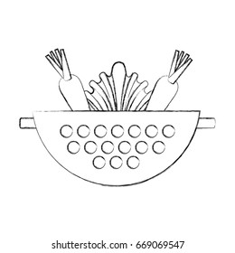 Metal kitchen strainer with vegetables