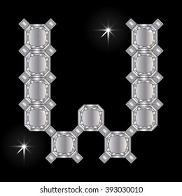 Metal letter W. Faceting gemstone. Geometric polygonal shapes