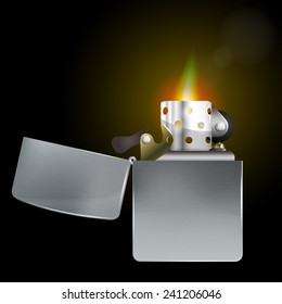 metal lighter with flame on a black background