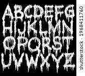 Metal music band font.White smudged and tattered alphabet on black background.