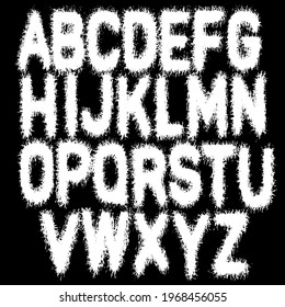 Metal music band font.White smudged and tattered alphabet on black background.