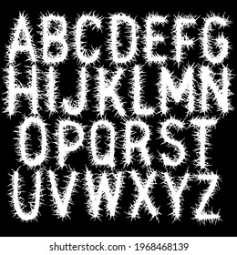 Metal music band font.White smudged and tattered alphabet on black background.