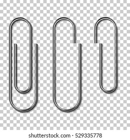 Metal paper clips isolated and attached to paper