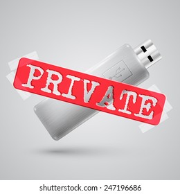 A metal pendrive with a warning sign
