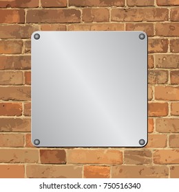 metal plaque on brick wall
