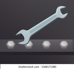 metal spanner tool repairing opening screw on dark background 