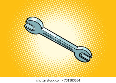 Metal wrench tool isolated on a pop art background