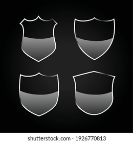 metallic black shield or badges icons set