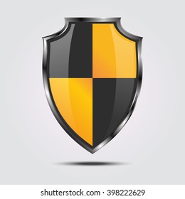 Metallic black and yellow silver shield. Vector icon isolated on white background