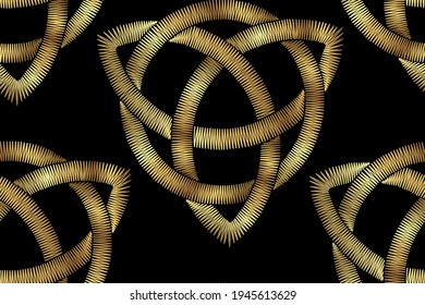Metallic embroidery seamless pattern on a black background. Golden celtic pattern. Irish ornament for decoration