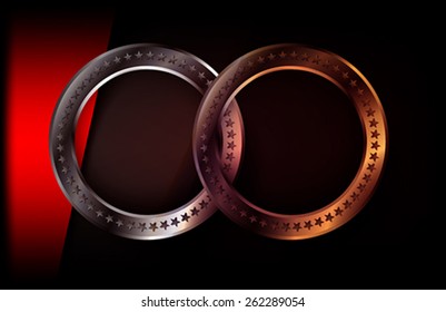 The metallic rings on dark background