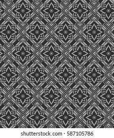 metallic silver pattern on black background made of geometric elements and iron flower