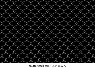 Metallic wire fence pattern on black background