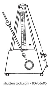 Metronome isolated on white, vintage engraved illustration. Trousset encyclopedia (1886 - 1891).