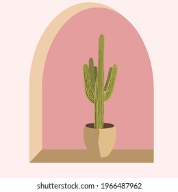Mexican cereus in a ceramic pot on the window