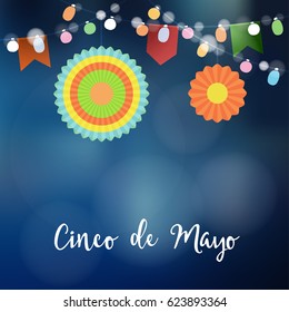 Mexican Cinco de Mayo greeting card, invitation. Party decoration, string of light bulbs, paper flags and colorful lanterns. Modern blurred background. Vector illustration.