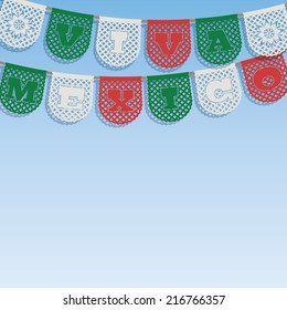 mexican decoration, with viva mexico (long live mexico) paper bunting ornaments on blue sky background, with clipping path