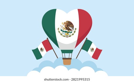 Mexican flag designed as a heart-shaped hot air balloon floating above clouds with two small waving flags on both sides in a blue sky.
