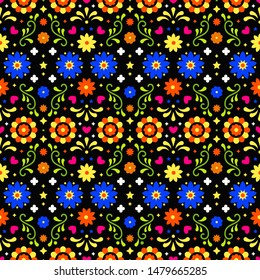 Mexican folk art seamless pattern with flowers on dark background. Traditional design for fiesta party. Colorful floral ornate elements from Mexico. Mexican folklore ornament.
