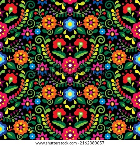 Mexican folk art vector seamless pattern with flowers, textile or fabric print design inspired by traditional embroidery ornaments from Mexico on black. Nature floral wallpaper