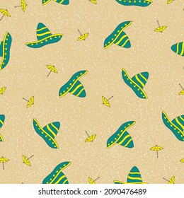 Mexican hat green sombrero and cocktail yellow umbrella on a sand. vector illustration