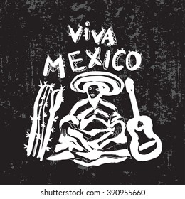 Mexican man with guitar and cactus
