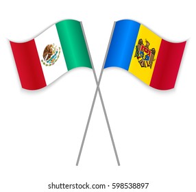 Mexican and Moldovan crossed flags. Mexico combined with Moldova isolated on white. Language learning, international business or travel concept.