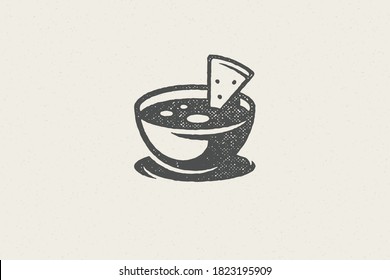 Mexican nacho silhouette into bowl with sauce for fast food hand drawn stamp effect vector illustration. Grunge texture symbol for package and fast food restaurant menu design or label decoration