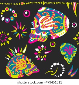 Mexican seamless vector pattern on a theme of the day of the dead. Painted skulls in profile with beads and ethnic elements. Purple, blue, green on black background.
