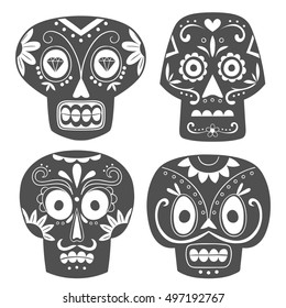 Mexican skull set. Cute black and white sugar skulls in cartoon style. Vector Illustration.