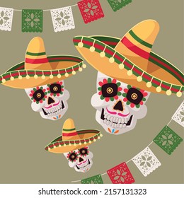 mexican skulls with hats and garland