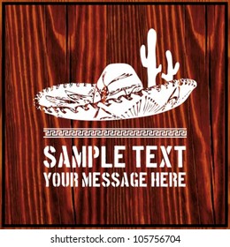 Mexican sombrero with cactus and text on wooden background