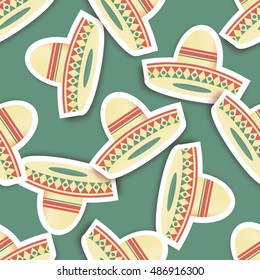 Mexican sombrero hat seamless pattern.. Wear design element on green background/ Vector illustration.