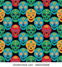 Mexican style, seamless pattern, painted skulls, geometric layout on black background. Folk art. Hand drawing. Design for package, textiles, wallpapers, printed products. Vector illustration
