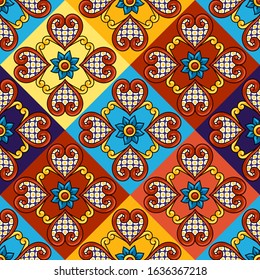 Mexican talavera ceramic tile seamless pattern. Decoration with ornamental flowers. Traditional decorative objects. Ethnic folk ornament.